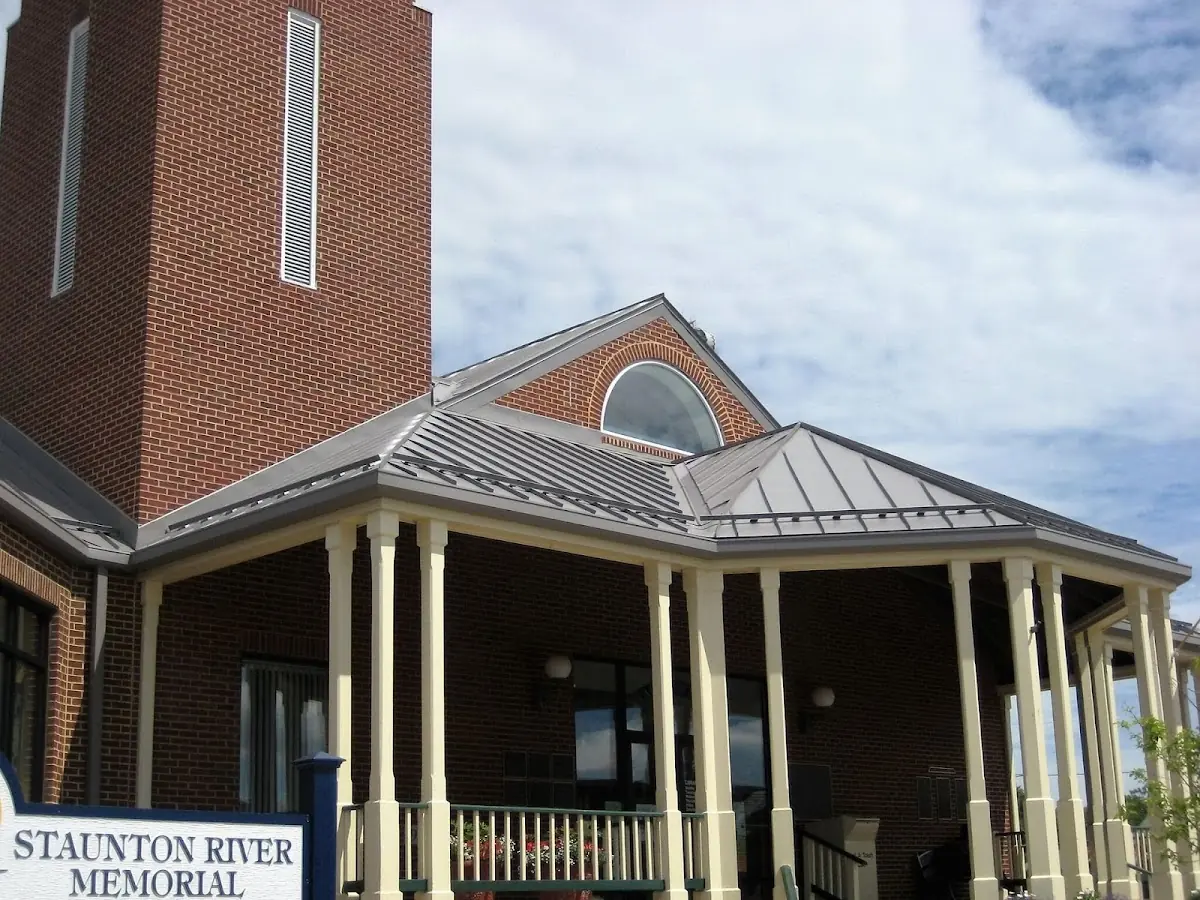 Skilled roofing craftsmen working on a residential roof in Fells Point